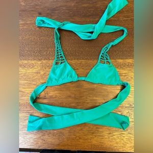 Acacia swimsuit top in green with crochet detail